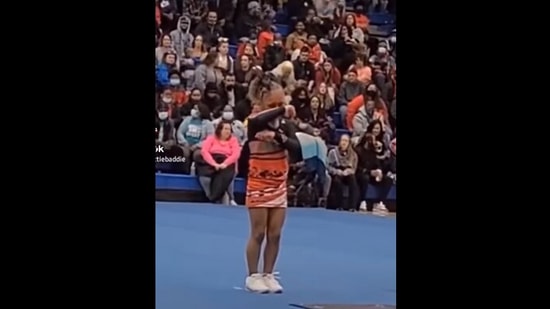 The little girl crying before her first cheer competition as the crowd cheers her on. (instagram/@tattiebaddie_) The little girl crying before her first cheer competition as the crowd cheers her on. (instagram/@tattiebaddie_)
