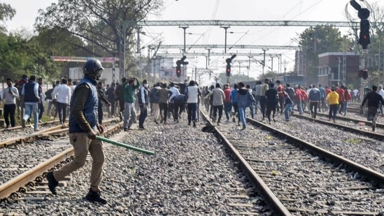 Aspirants block railway tracks during their protest over Railways NTPC exam.&nbsp;