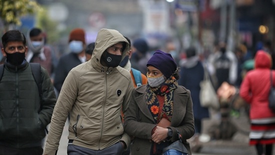 Shoppers in a market in national capital.