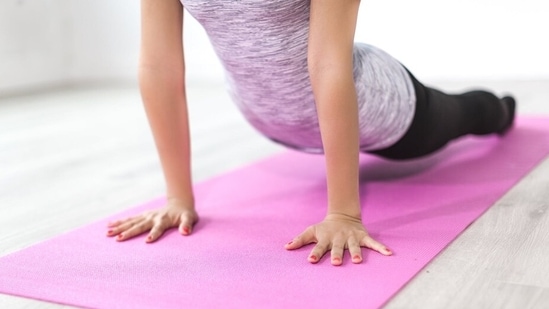 Even those who have mild symptoms are being advised to practice yoga as many of them are reporting fatigue, cough or brain fog even weeks after their recovery.(Pexels)