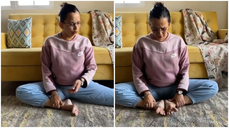 For the second stretch, bring both your feet closer to your pelvic area and bring them together. For the second stretch, bring both your feet closer to your pelvic area and bring them together.