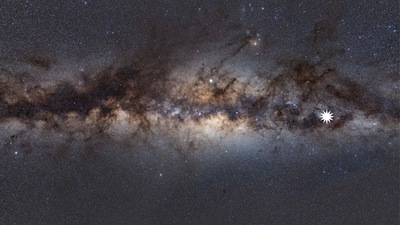 This undated handout image by astrophysicist Natasha Hurley-Walker from the Curtin University node of the ICRAR shows the Milky Way as viewed from Earth, with a star icon (at R-placed by source) marking the position of a mysterious repeating transient in space. (AFP PHOTO / ICRAR / Curtin / Natasha Hurley-Walker) This undated handout image by astrophysicist Natasha Hurley-Walker from the Curtin University node of the ICRAR shows the Milky Way as viewed from Earth, with a star icon (at R-placed by source) marking the position of a mysterious repeating transient in space. (AFP PHOTO / ICRAR / Curtin / Natasha Hurley-Walker)