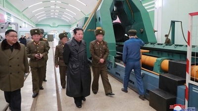 North Korea leader Kim Jong-Un visits a munitions factory producing what state media KCNA says is a "major weapon system" at an undisclosed location in North Korea. (via Reuters)