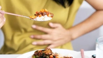 Avoid overeating if you are prone to acidity. (Shutterstock)