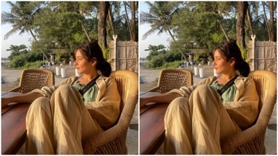 Neha posed by the sea in comfy clothes and stared at the sunset. (Instagram/@nehasharmaofficial)
