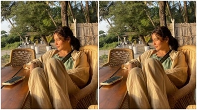 Dressed to chill, Neha paired a comfy set of trousers with an oversized shirt as she posed for sister Aisha Sharma's camera. (Instagram/@nehasharmaofficial)