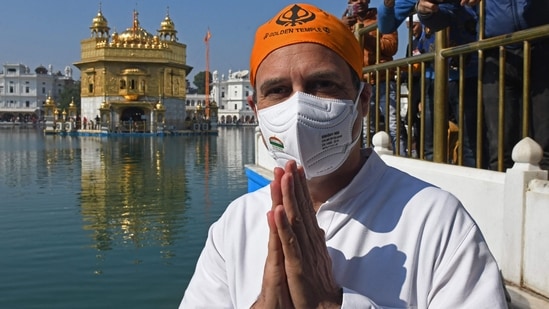 Congress leader Rahul Gandhi kickstarted his campaign in Punjab by offering prayers at the Golden Temple in Amritsar on Thursday. During his stay, he will visit Sri Harmandir Sahab, Durgiana Mandir, and Bhagwan Valmiki Tirath Sthal along with 117 Congress candidates.(AFP)