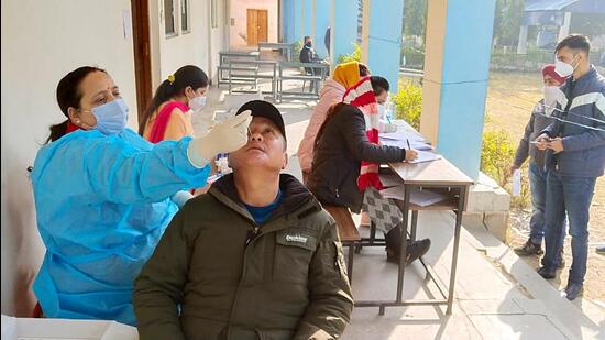 Jammu, Jan 27 (ANI): A healthcare worker collects a nasal sample of a man for the COVID-19 test in view of the rising coronavirus cases, in Jammu on Thursday. (ANI Photo) (Shanky Rathore) Jammu, Jan 27 (ANI): A healthcare worker collects a nasal sample of a man for the COVID-19 test in view of the rising coronavirus cases, in Jammu on Thursday. (ANI Photo) (Shanky Rathore)