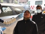 A health worker collects swab samples of a man for Covid-19 testing, in Gurugram on Thursday. (Vipin Kumar /HT) A health worker collects swab samples of a man for Covid-19 testing, in Gurugram on Thursday. (Vipin Kumar /HT)