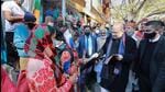 Union minister Amit Shah distributes pamphlets during his door-to-door campaign ahead of the Uttarakhand assembly elections, in Rudraprayag on Friday. (PTI) Union minister Amit Shah distributes pamphlets during his door-to-door campaign ahead of the Uttarakhand assembly elections, in Rudraprayag on Friday. (PTI)