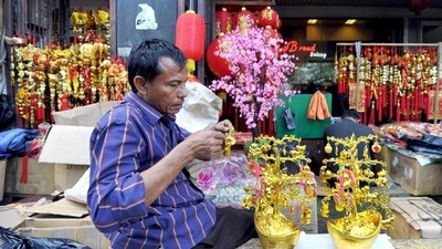 Chinese Holiday Travel Makes a Slow Recovery as Omicron Spreads