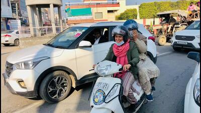 AAP candidate Narinder Kaur Bharaj on her way to file nomination papers for the Punjab polls on an Activa in Sangrur. (HT Photo) AAP candidate Narinder Kaur Bharaj on her way to file nomination papers for the Punjab polls on an Activa in Sangrur. (HT Photo)