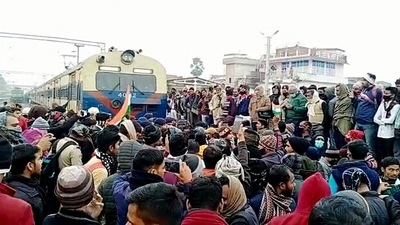 Students stage a protest against the alleged erroneous results of the Railway Recruitment Board's Non-Technical Popular Categories (RRB NTPC) exam 2021, at Patna-Gaya railway track, in Jehanabad on Wednesday. (ANI Photo) Students stage a protest against the alleged erroneous results of the Railway Recruitment Board's Non-Technical Popular Categories (RRB NTPC) exam 2021, at Patna-Gaya railway track, in Jehanabad on Wednesday. (ANI Photo)
