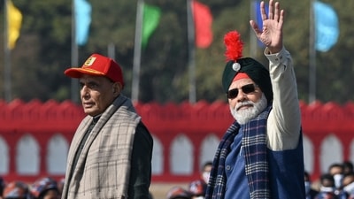 PM Modi donned his signature kurta-churidar set and a blue jacket during his visit to the rally which is the culmination of the NCC Republic Day Camp held every year on January 28. (AFP) PM Modi donned his signature kurta-churidar set and a blue jacket during his visit to the rally which is the culmination of the NCC Republic Day Camp held every year on January 28. (AFP)