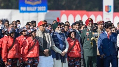 After the culmination of the rally, PM Modi distributed medals and batons to the NCC candidates. (PTI) After the culmination of the rally, PM Modi distributed medals and batons to the NCC candidates. (PTI)
