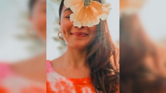 Alia Bhatt left her fans spellbound with this beautiful picture of her smile and her dimpled cheeks.(Instagram/@aliaabhatt)