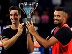 Nick Kyrgios, right, and Thanasi Kokkinakis, left, of Australia pose with their trophy after defeating compatriots Matthew Ebden and Max Purcell in the men's doubles final at the Australian Open. Nick Kyrgios, right, and Thanasi Kokkinakis, left, of Australia pose with their trophy after defeating compatriots Matthew Ebden and Max Purcell in the men's doubles final at the Australian Open.