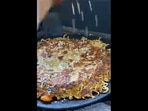 The eatery in Indore prepares the Maggi paratha by grating some cheese onto it as a finishing touch. (instagram/@world_wide_food_blogger) The eatery in Indore prepares the Maggi paratha by grating some cheese onto it as a finishing touch. (instagram/@world_wide_food_blogger)