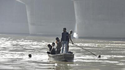 A police team accompanied by divers reached Yamuna river on Saturday afternoon for search operations. (Sunil Ghosh)