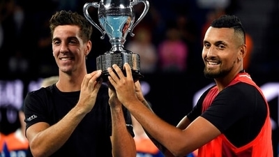 Nick Kyrgios, right, and Thanasi Kokkinakis, left, of Australia pose with their trophy after defeating compatriots Matthew Ebden and Max Purcell in the men's doubles final at the Australian Open. (AP) Nick Kyrgios, right, and Thanasi Kokkinakis, left, of Australia pose with their trophy after defeating compatriots Matthew Ebden and Max Purcell in the men's doubles final at the Australian Open. (AP)