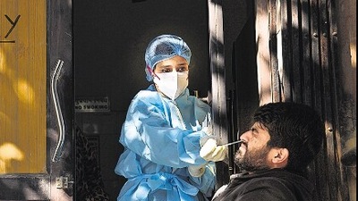 A man gets a Covid-19 test in Delhi.