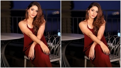 Disha rounded off her glam by leaving her auburn tresses open in a side-swept style with curled ends and choosing red lip shade, winged eyeliner, kohl-adorned eyelids, subtle eye shadow, glowing skin, mascara-clad lashes, blushed cheeks, and sharp contouring. (Instagram/@dishaparmar) Disha rounded off her glam by leaving her auburn tresses open in a side-swept style with curled ends and choosing red lip shade, winged eyeliner, kohl-adorned eyelids, subtle eye shadow, glowing skin, mascara-clad lashes, blushed cheeks, and sharp contouring. (Instagram/@dishaparmar)