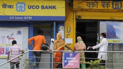 People stand in a queue outside the UCO Bank branch. (Sunil Ghosh/ HT File Photo) People stand in a queue outside the UCO Bank branch. (Sunil Ghosh/ HT File Photo)