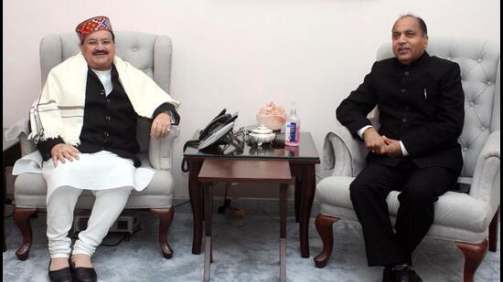 Himachal CM Jai Ram Thakur (right) with BJP national president JP Nadda at New Delhi on Friday. (HT Photo)
