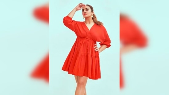 Acing the bold orange lips and double-winged liner, Huma Qureshi gives bold poses for the camera.(Instagram/@iamhumaq)