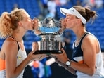 Czech Republic's Barbora Krejcikova and Katerina Siniakova celebrate with the trophy