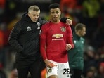 Former Manchester United manager Ole Gunnar Solskjaer (left) and Mason Greenwood walk on the pitch. (AP/File Photo) Former Manchester United manager Ole Gunnar Solskjaer (left) and Mason Greenwood walk on the pitch. (AP/File Photo)