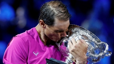 Spain's Rafael Nadal celebrates winning the final with trophy. (REUTERS)