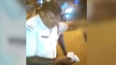 A video of the traffic police official physically and verbally assaulting a differently abled woman went viral on social media. (Video grab)