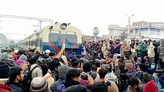 Students stage a protest against the alleged erroneous results of the Railway Recruitment Board's Non-Technical Popular Categories (RRB NTPC) exam 2021, at Patna-Gaya railway track in Jehanabad on Wednesday. (ANI Photo)