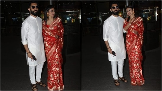 Suraj complements his wife in a white silk kurta pyjama set.(HT Photo/Varinder Chawla)