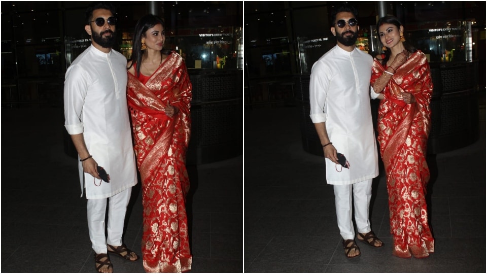 Suraj complements his wife in a white silk kurta pyjama set. (HT Photo/Varinder Chawla)