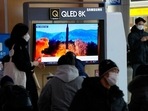 People watch a TV showing an image of North Korea's missile launch during a news program at the Seoul Railway Station in Seoul, South Korea. People watch a TV showing an image of North Korea's missile launch during a news program at the Seoul Railway Station in Seoul, South Korea.