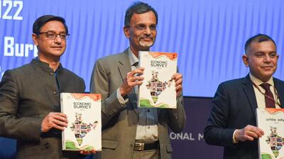 Chief Economic Advisor V Anantha Nageswaran along with Principal Economic Adviser Sanjeev Sanyal and Rajiv Mishra show the Economic Survey 2021-22, tabled in both the Houses of Parliament by Union Finance Minister Nirmala Sitharaman in New Delhi on Monday. (PTI PHOTO.) Chief Economic Advisor V Anantha Nageswaran along with Principal Economic Adviser Sanjeev Sanyal and Rajiv Mishra show the Economic Survey 2021-22, tabled in both the Houses of Parliament by Union Finance Minister Nirmala Sitharaman in New Delhi on Monday. (PTI PHOTO.)