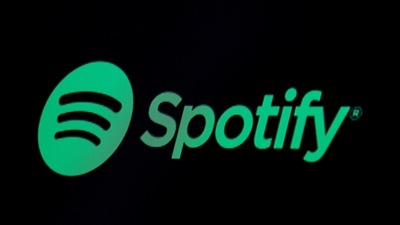 The Spotify logo is displayed on a screen on the floor of the New York Stock Exchange (NYSE) in New York, US. (Reuters)
