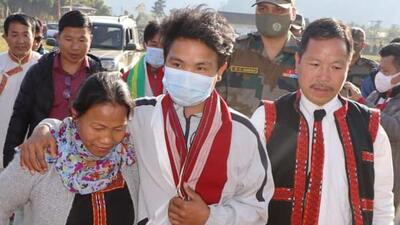 Miram Taron (centre) with his parents at Tuting in Arunachal Pradesh on Monday. (PHOTO: Spear Corps-Indian Army .) Miram Taron (centre) with his parents at Tuting in Arunachal Pradesh on Monday. (PHOTO: Spear Corps-Indian Army .)