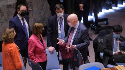 Russian Ambassador to the UN Vassily Nebenzia (right) speaks with Norwegian Ambassador to the UN Mona Juul during a meeting of the UN Security Council on the situation between Russia and Ukraine, at the UN headquarters in New York City, US, on Monday. (REUTERS)