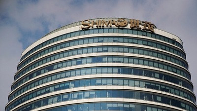 The logo of property developer Shimao Group is seen on the facade of Shimao Tower in Shanghai, China. (REUTERS)
