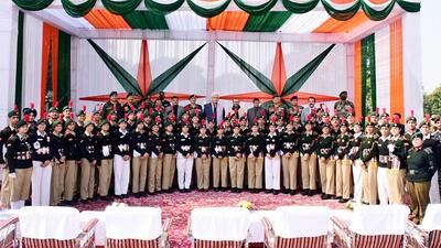 Jammu and Kashmir Lieutenant Governor Manoj Sinha in a group picture with the National Cadet Corps (contingents of J&K and Ladakh who participated in the 73rd Republic Day Parade held in Delhi, in Jammu on Monday. (ANI)