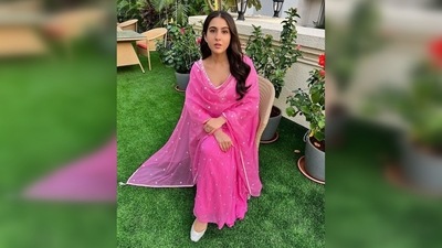 Sara Ali Khan poses with poise and elegance in this photo clicked outdoors in the garden wearing her gorgeous designer gharara set. Sara Ali Khan poses with poise and elegance in this photo clicked outdoors in the garden wearing her gorgeous designer gharara set.
