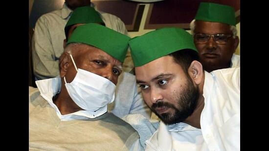 RJD chief Lalu Prasad Yadav with son Tejashwi Prasad Yadav. (ANI)