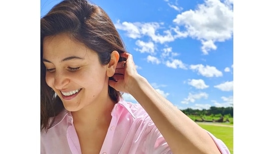 Anushka Sharma couldn't contain her happiness as the breeze kissed her blushed cheeks.(Instagram/@anushkasharma)