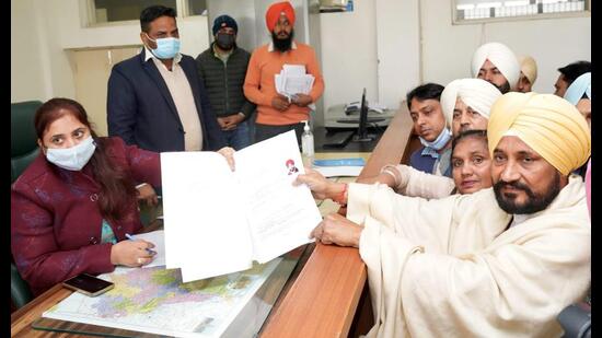 Chief minister Charanjit Singh Channi filing his nomination papers before the returning officer of Tapa on Monday for contesting the Bhadaur assembly elections. (HT Photo)