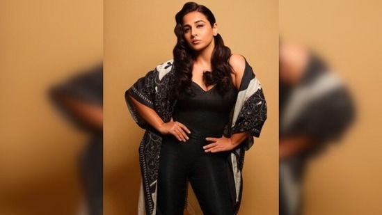 Vidya Balan donned a strappy body-hugging bodysuit teamed with high-rise trousers and a printed black and white cape.(Instagram/@balanvidya)