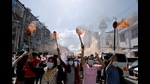 Women hold torches as they protest against the military coup in Yangon, MyanmarM, 2021. (REUTERS) Women hold torches as they protest against the military coup in Yangon, MyanmarM, 2021. (REUTERS)