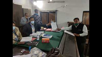 Nomination paper being taken by a Congress office bearer for party’s Phulpur candidate in Prayagraj on Tuesday. (HT photo) Nomination paper being taken by a Congress office bearer for party’s Phulpur candidate in Prayagraj on Tuesday. (HT photo)